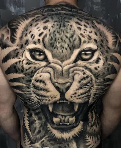 Golden cat tattoo